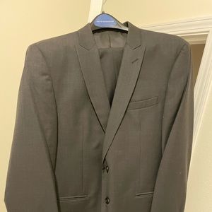 Michael Kors Suit. Color is ash black and the jacket size is 42R, pants 34x34.